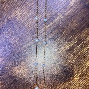 Elegant Gold and White Pearl Necklace